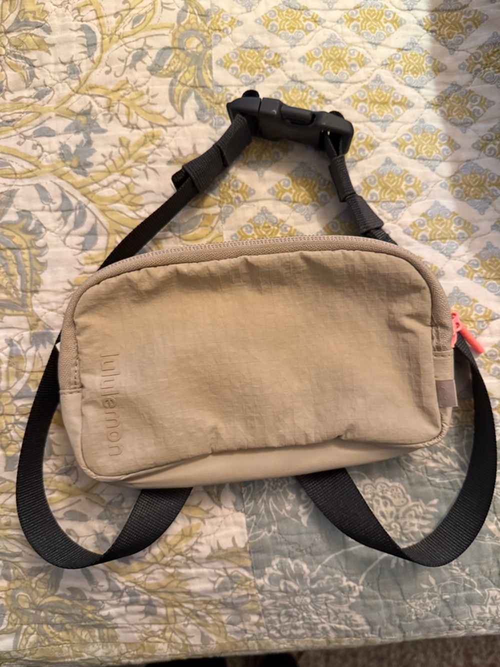 lululemon beige crossbody belt bag with black strap